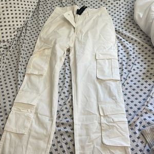 White cargo pants with pockets on side and string on bottom NWT size small